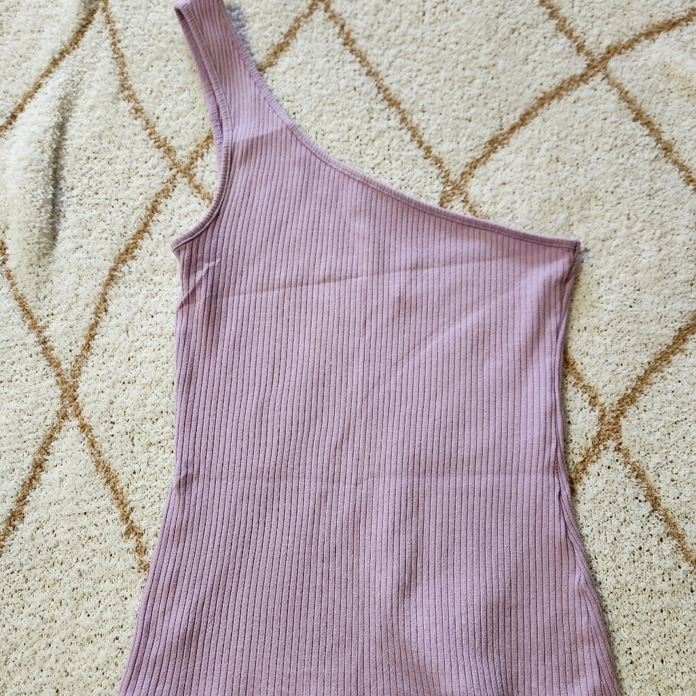 Purple one shoulder top.